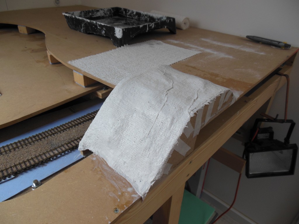 Dijklichaam bedekken met Plaster Cloth