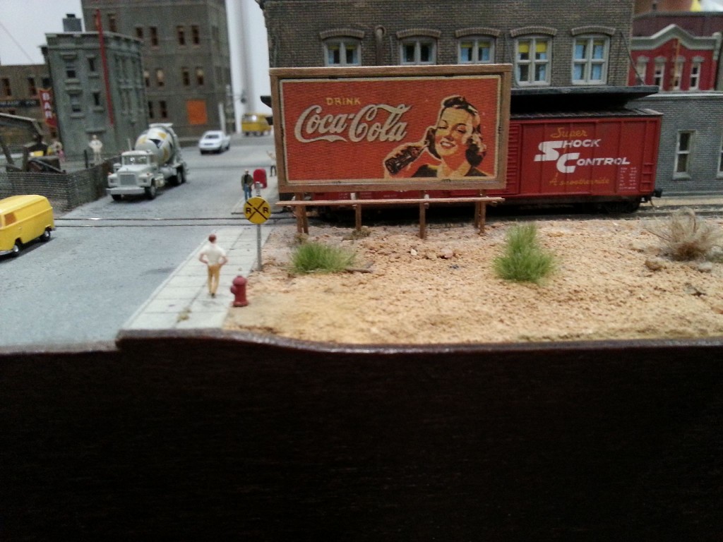 Detail opname van Cola-Cola bord op Amerikaanse N-spoorbaan